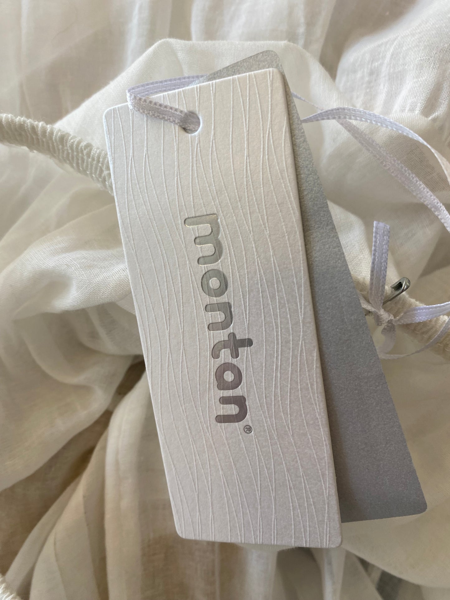 White top with floral embroidery