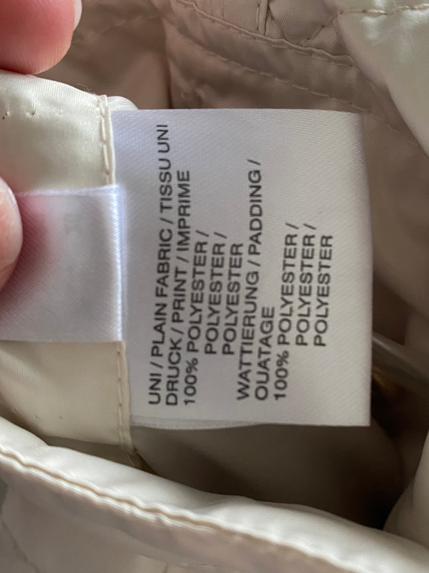 Cream quilted coat with snake print lining size 14