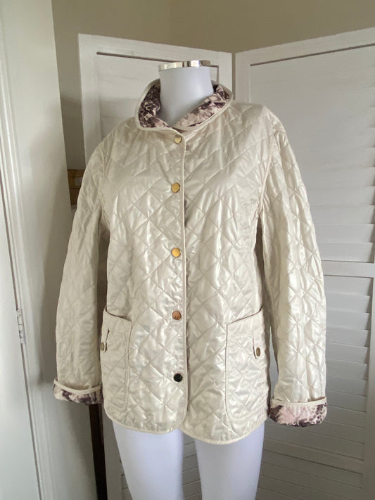 Cream quilted coat with snake print lining size 14