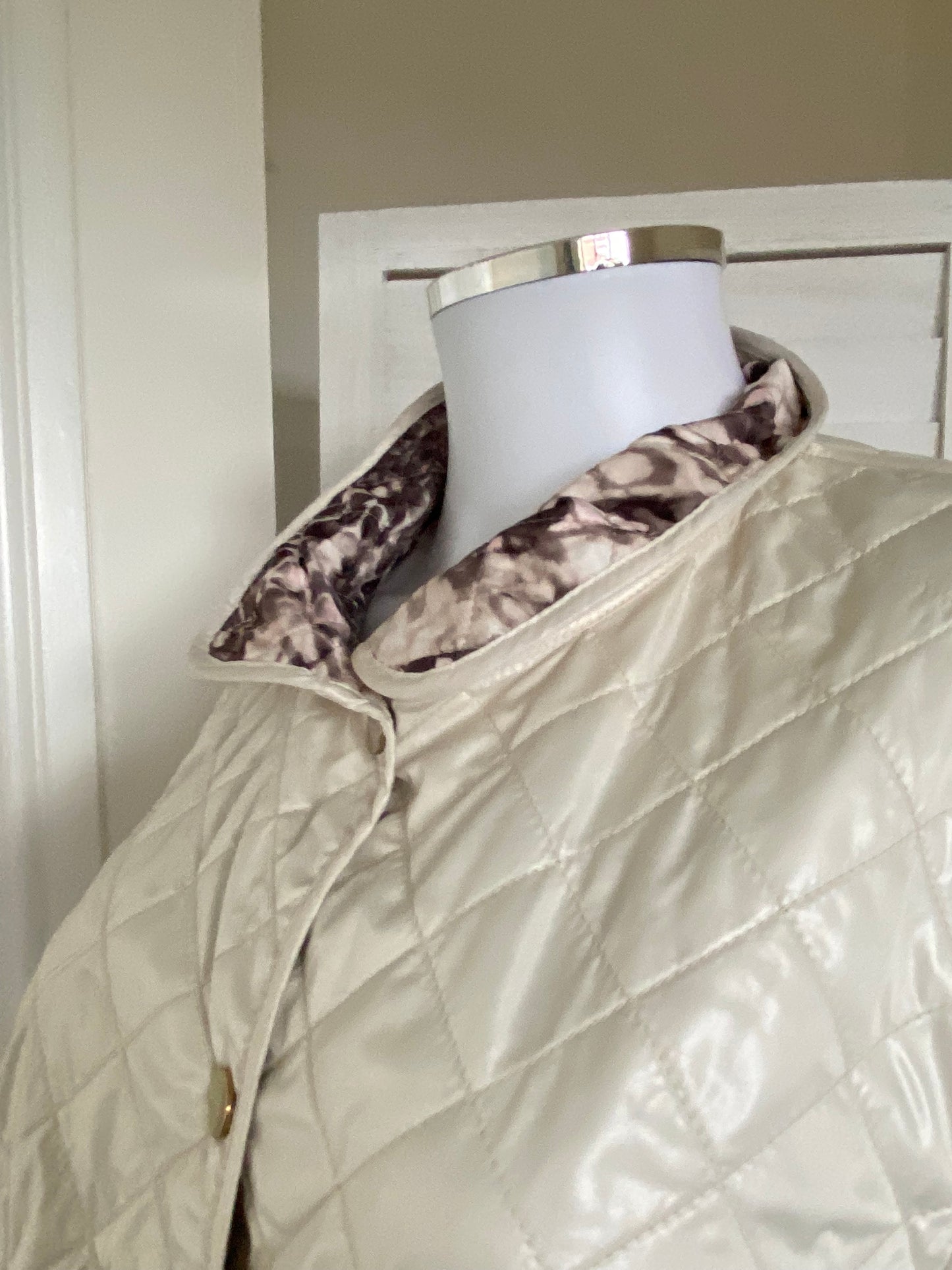 Cream quilted coat with snake print lining size 14
