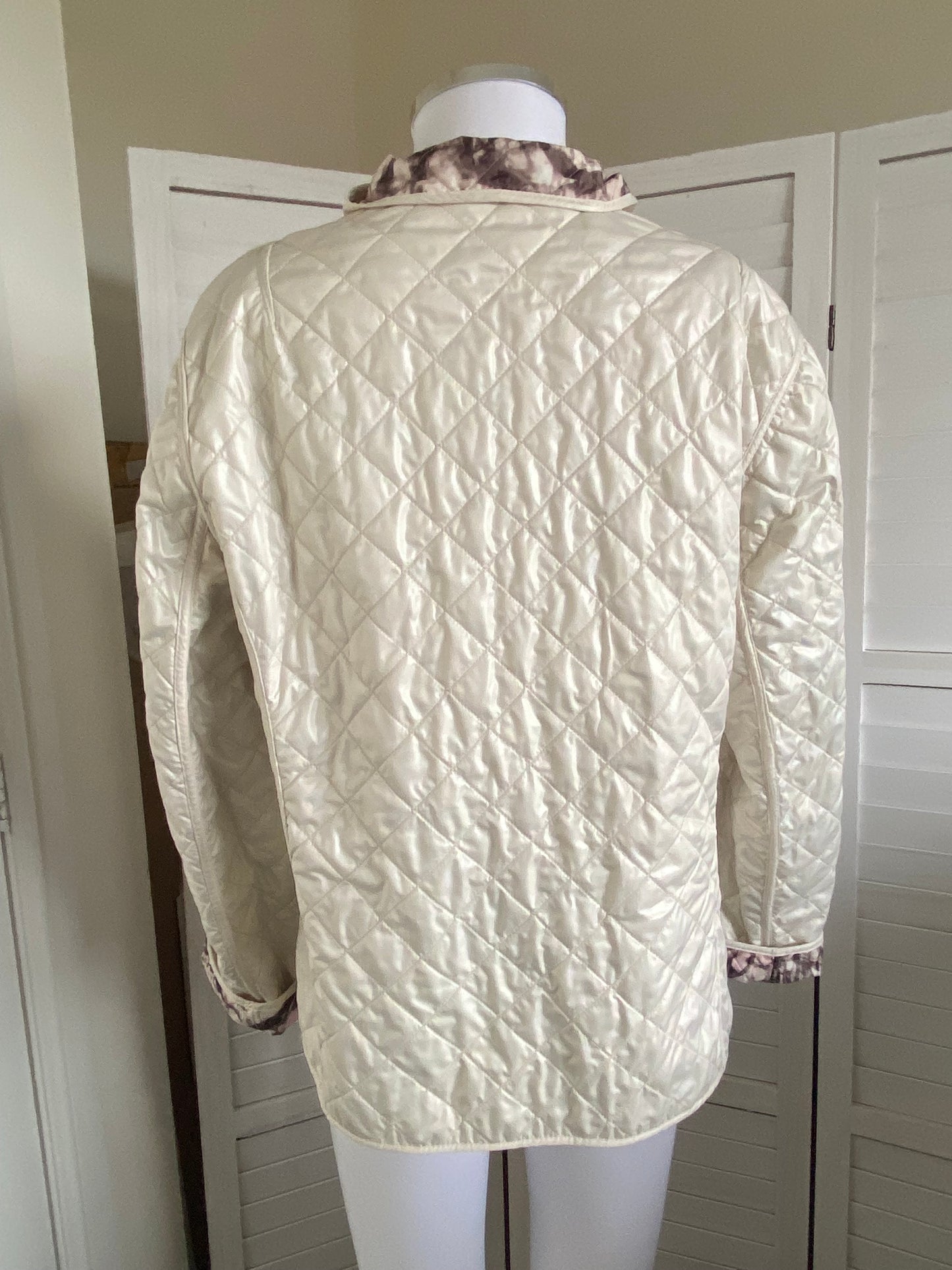 Cream quilted coat with snake print lining size 14