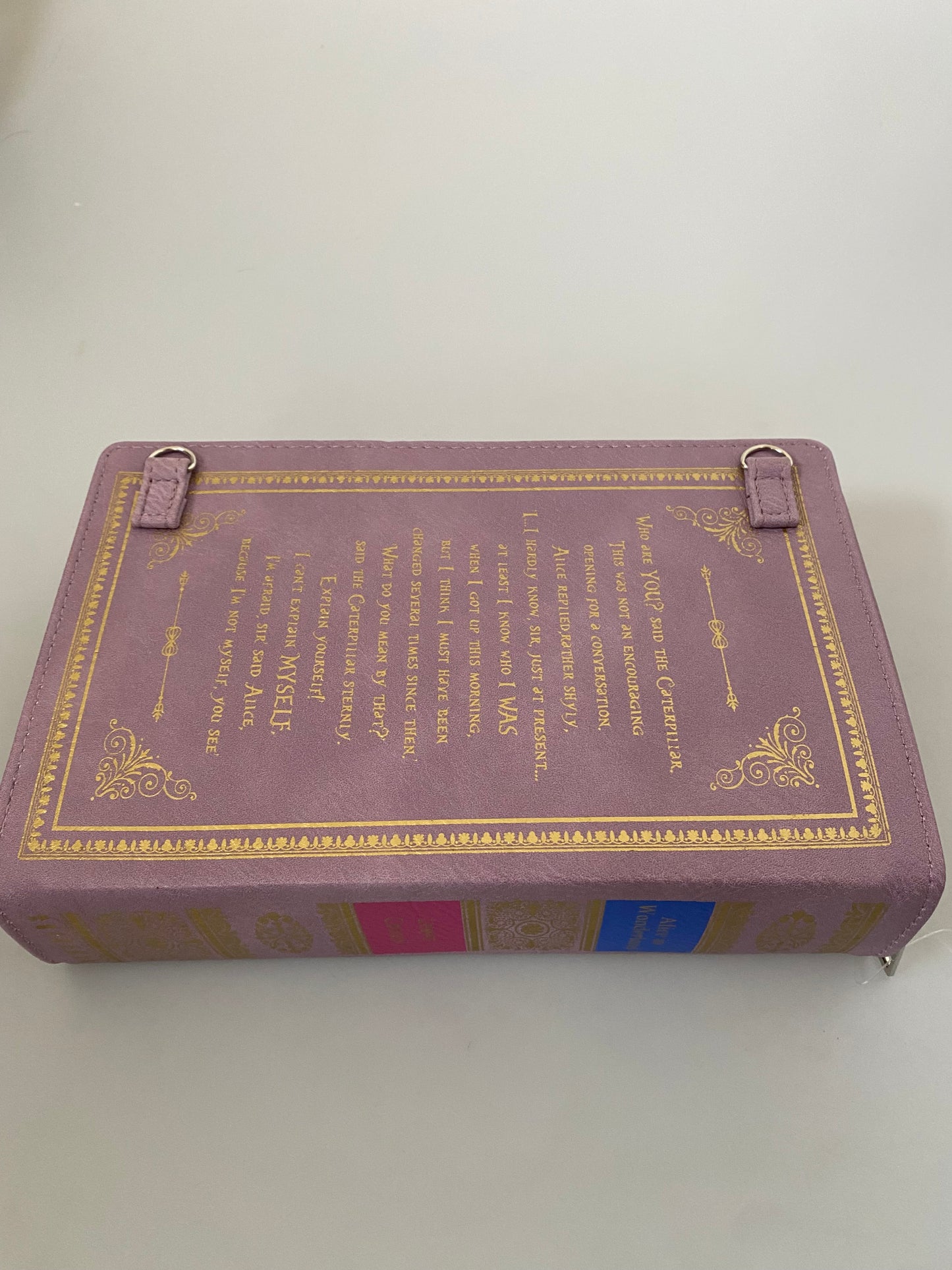 Alice in Wonderland book shaped handbag