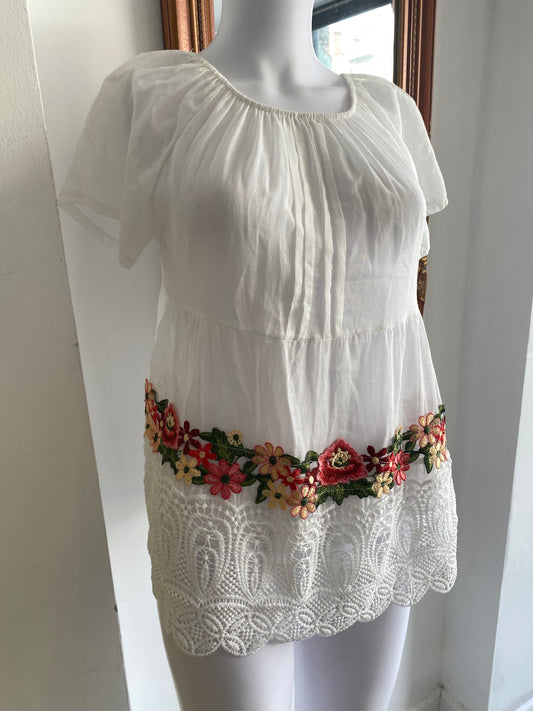 White top with floral embroidery