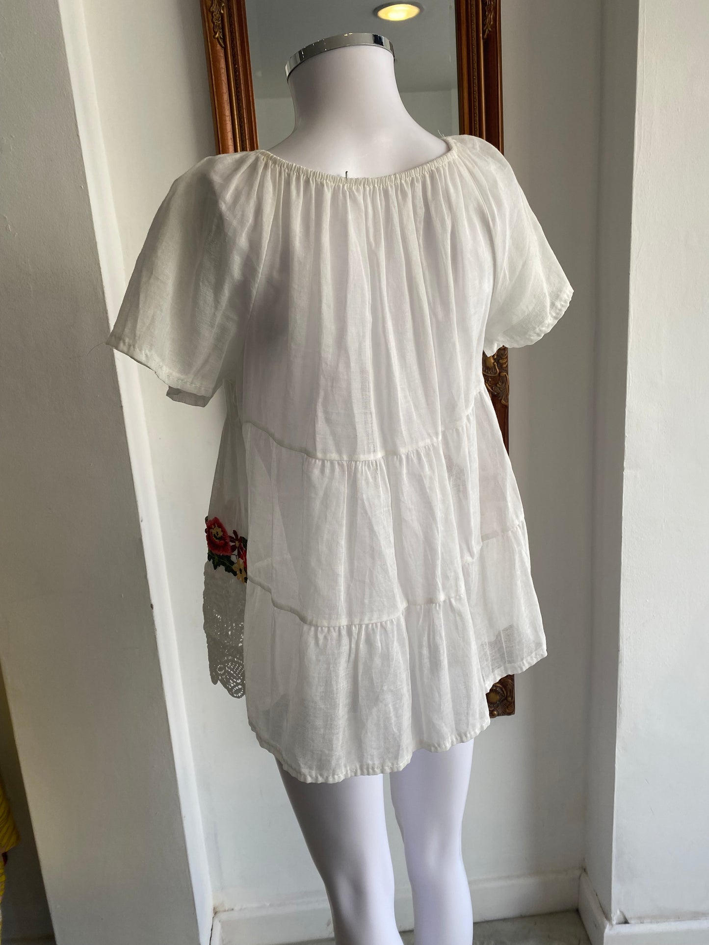 White top with floral embroidery