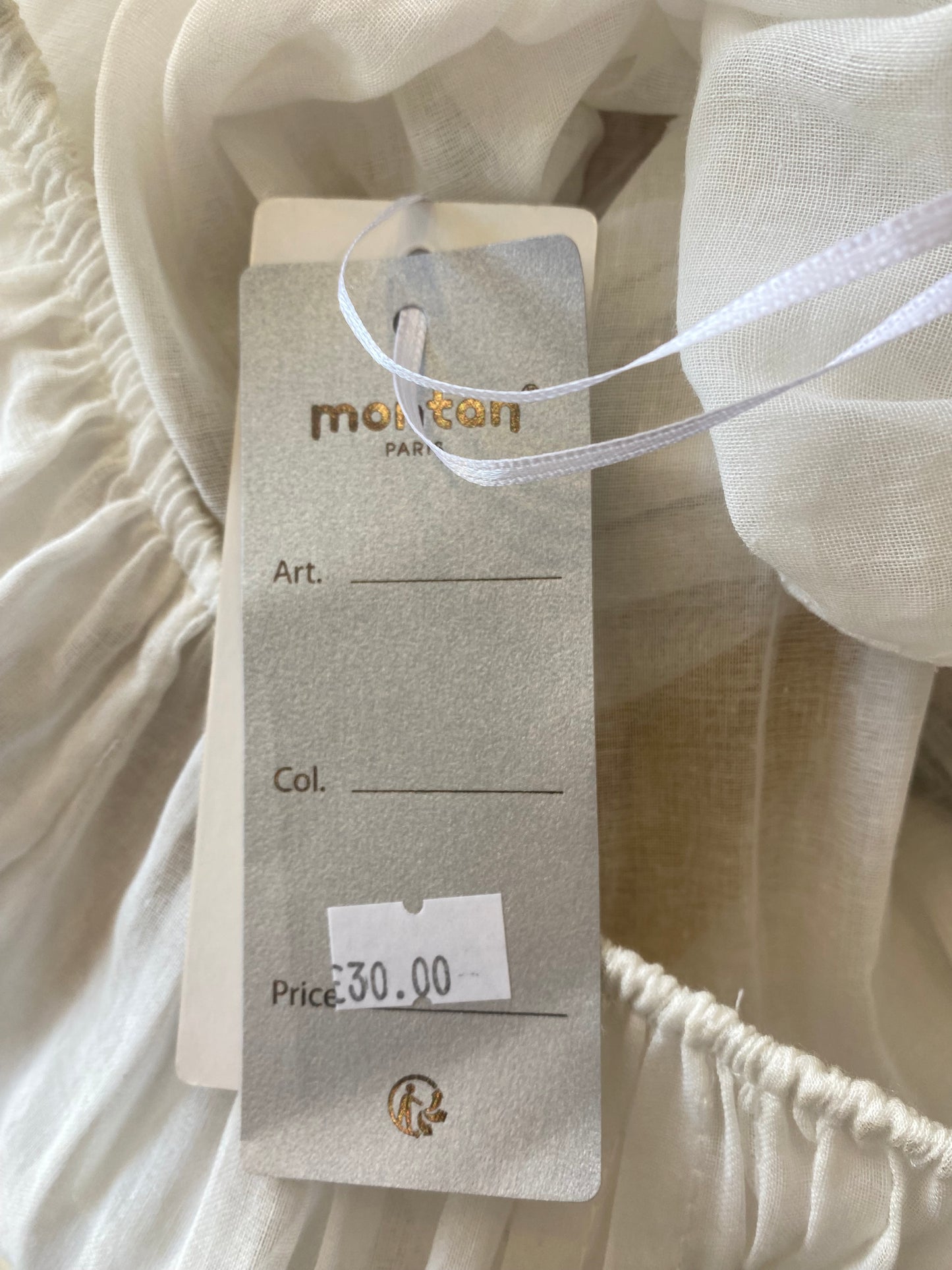 White top with floral embroidery