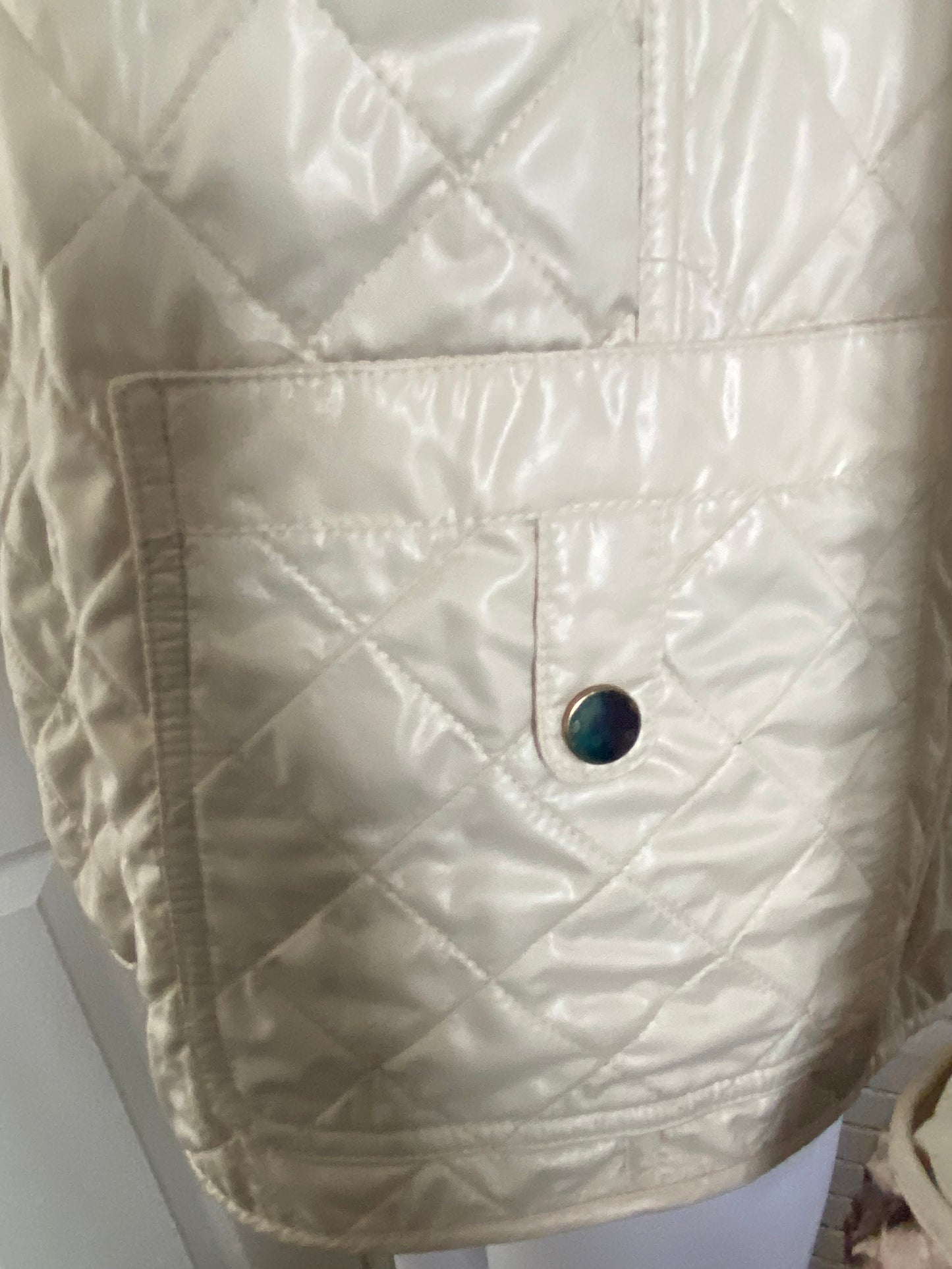 Cream quilted coat with snake print lining size 14