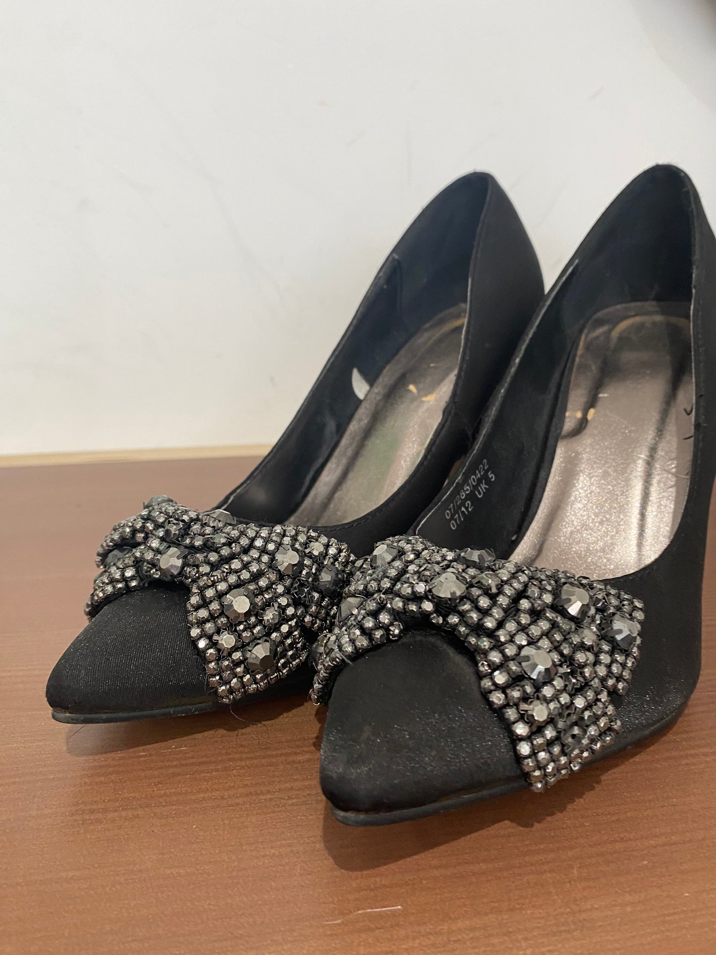 Crystal bow heels size 4