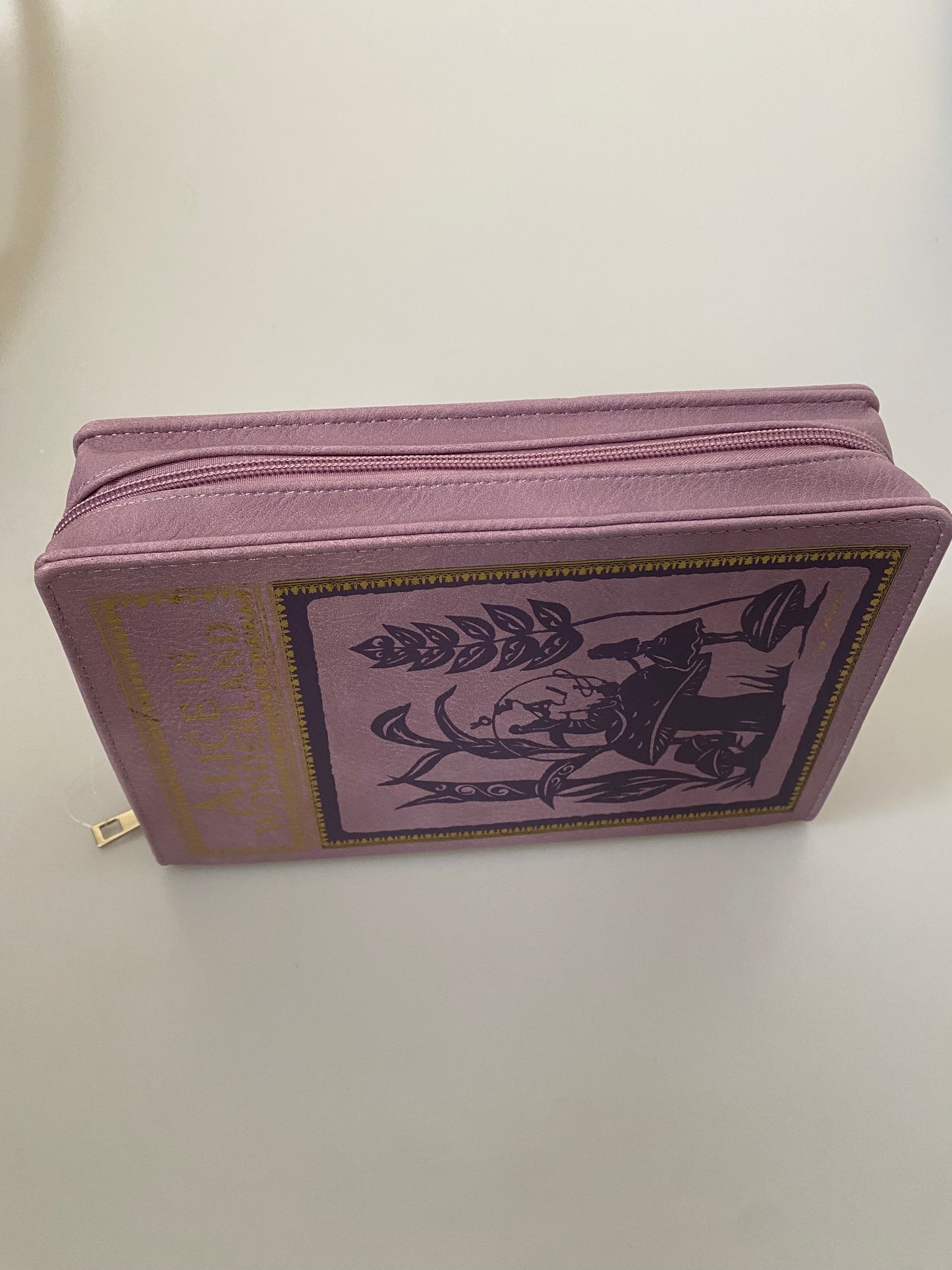 Alice in Wonderland book shaped handbag