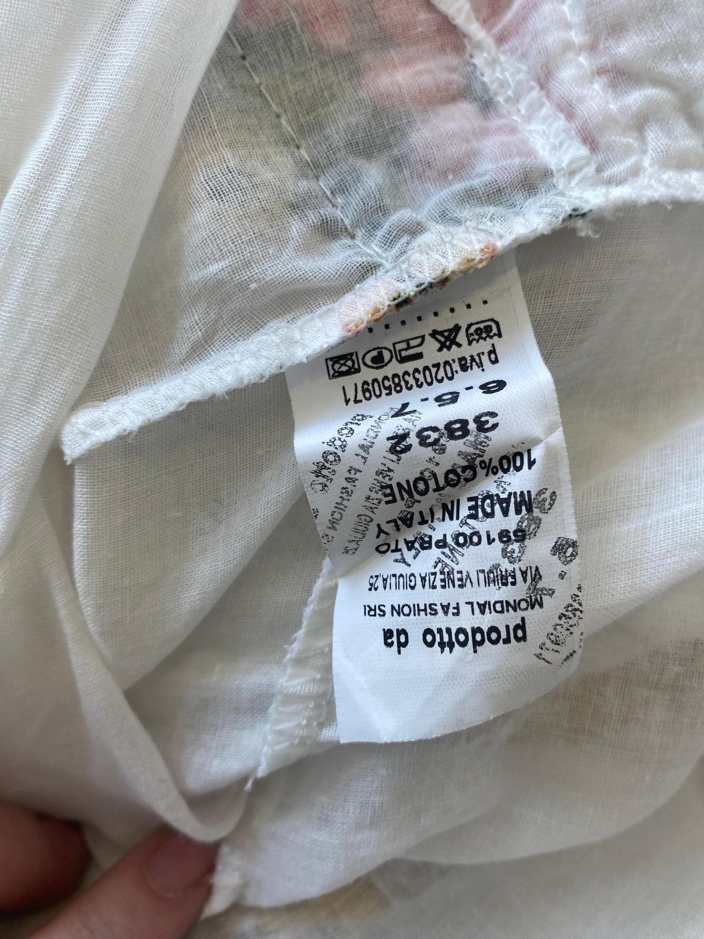 White top with floral embroidery